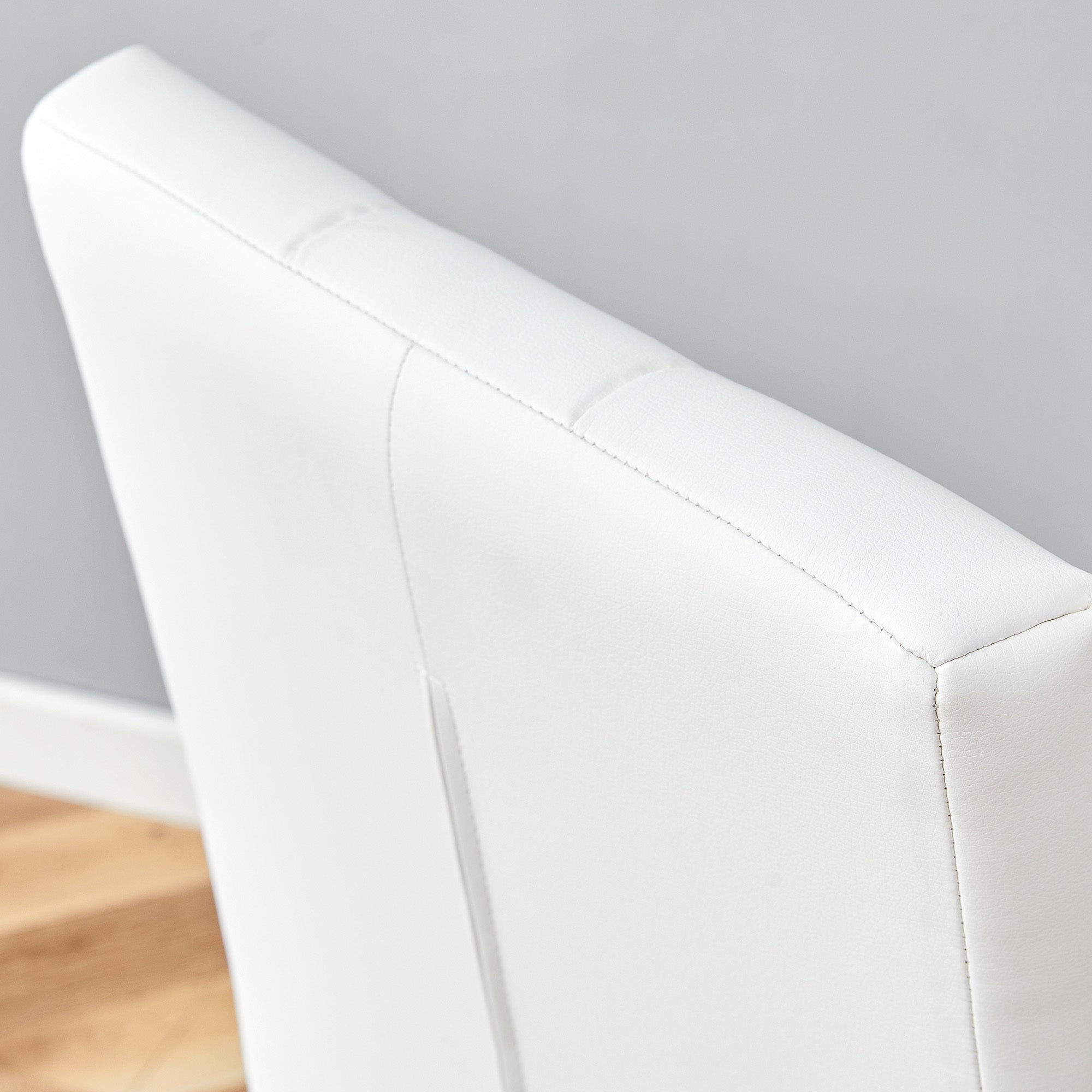 4 piece set of white dining chairs brings a touch of elegance and