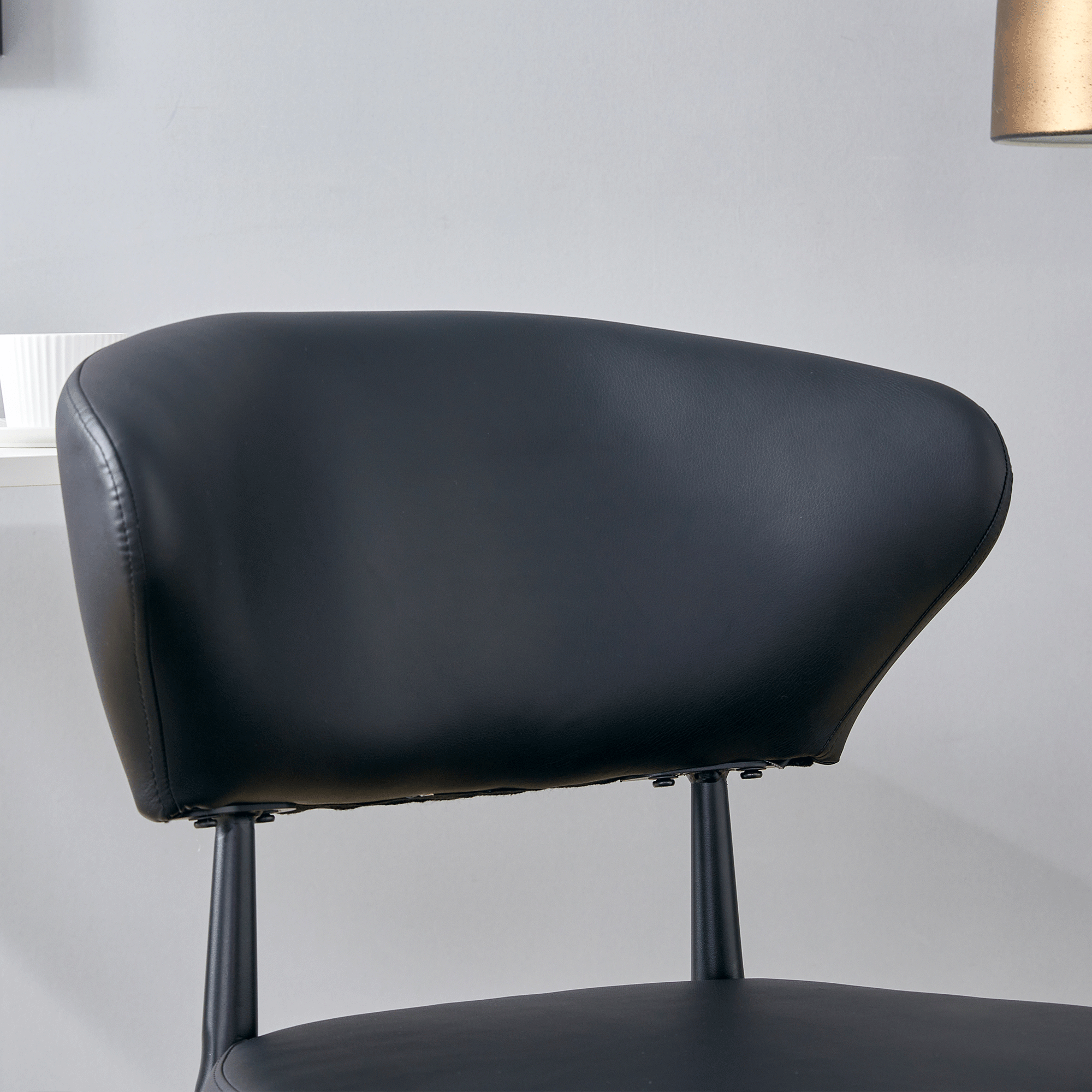 Black Minimalist Ergonomic Dining Chair, With A Curved Backrest For