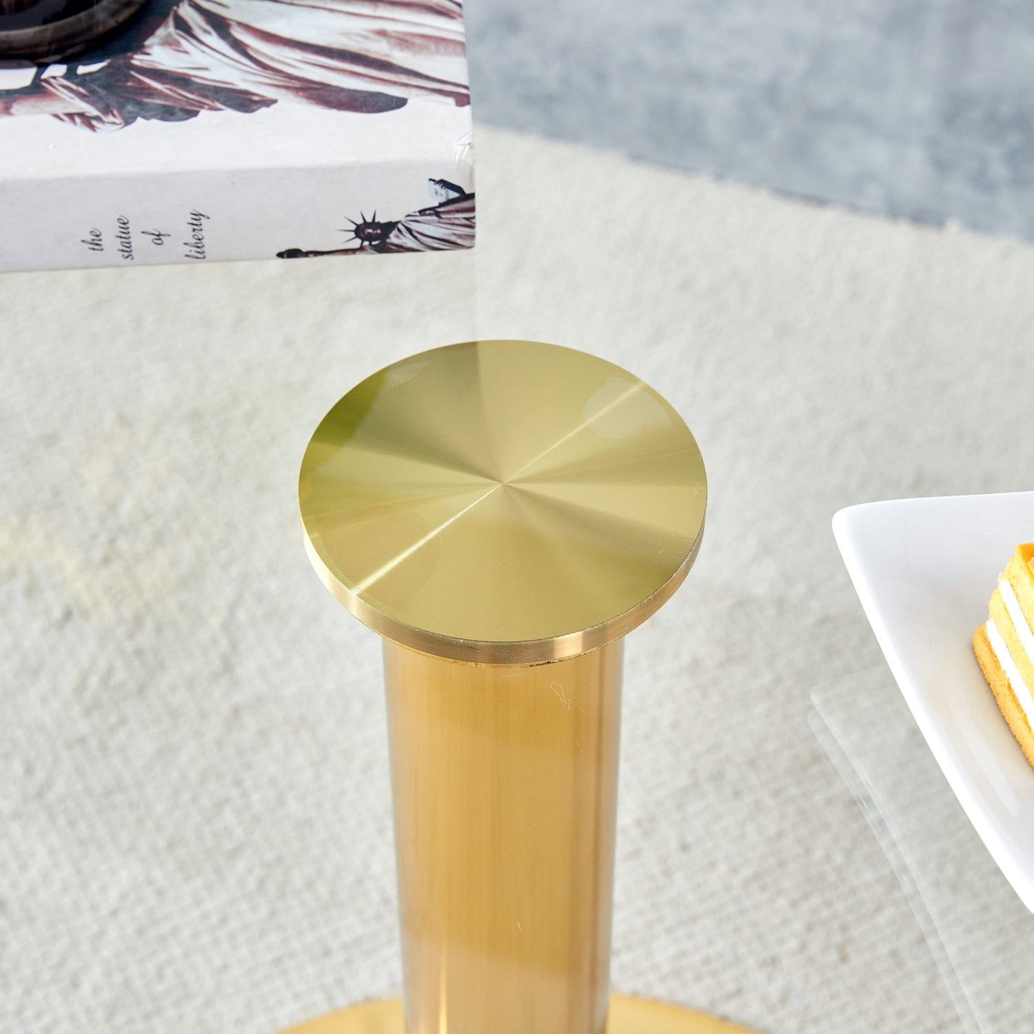 A 35-inch diameter glass top and a modern, minimalist round dining