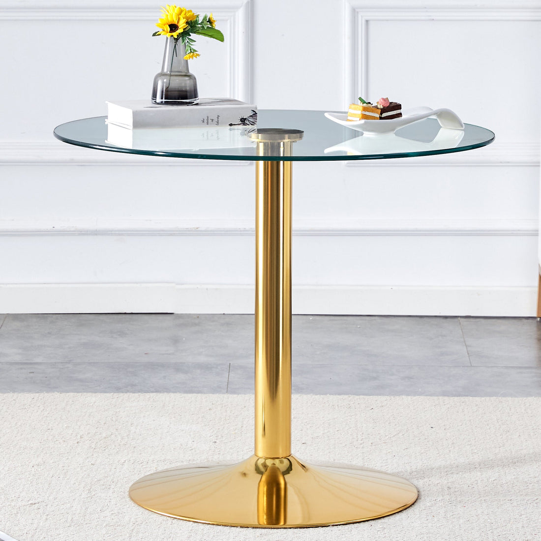 A 35-inch diameter glass top and a modern, minimalist round dining