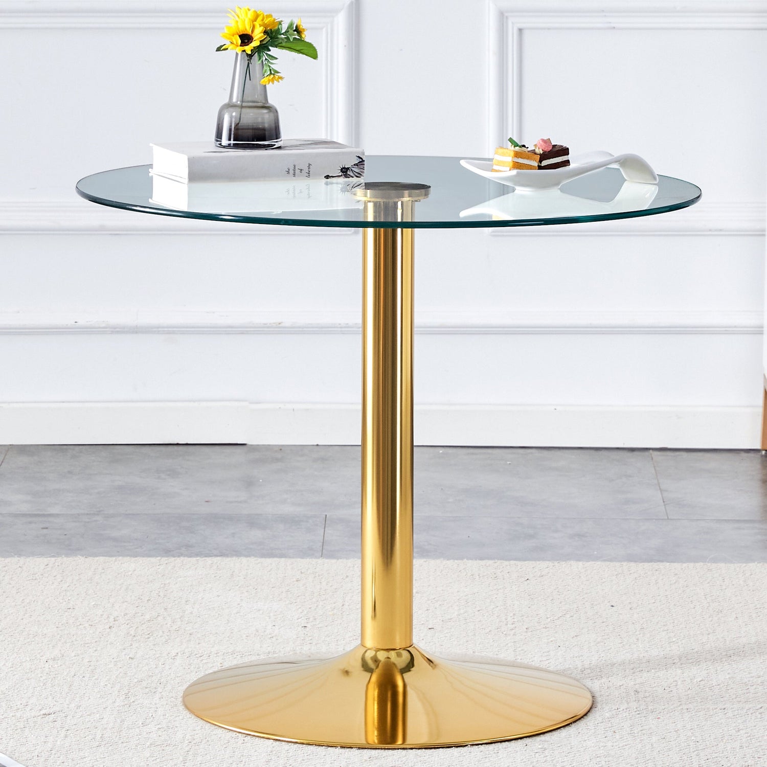 A 35-inch diameter glass top and a modern, minimalist round dining