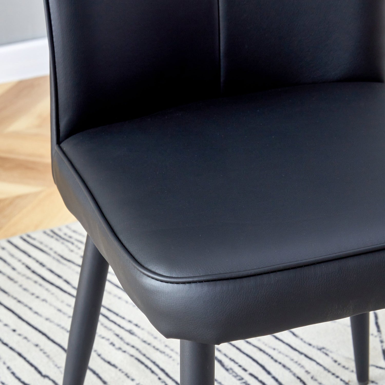Modern Black PU Chair Set - Four Pieces, The backrest has a vertical