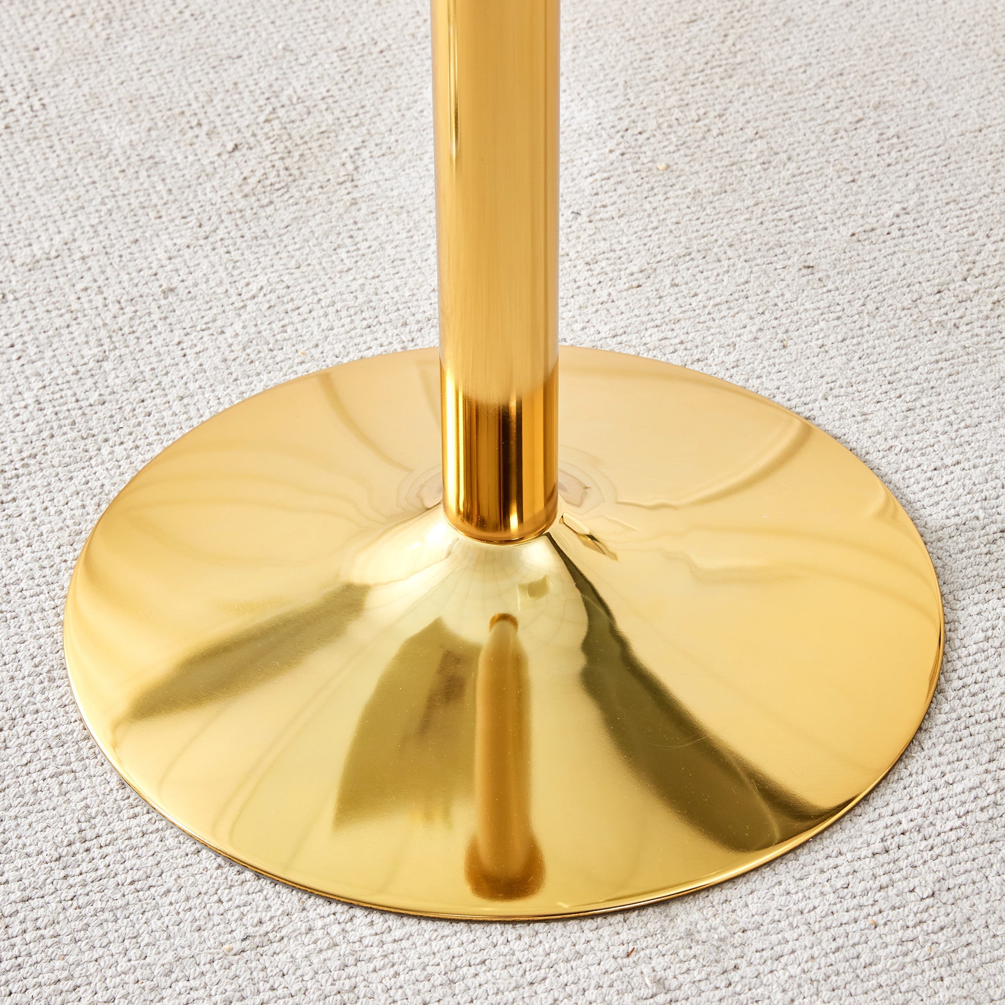 A 35-inch diameter glass top and a modern, minimalist round dining