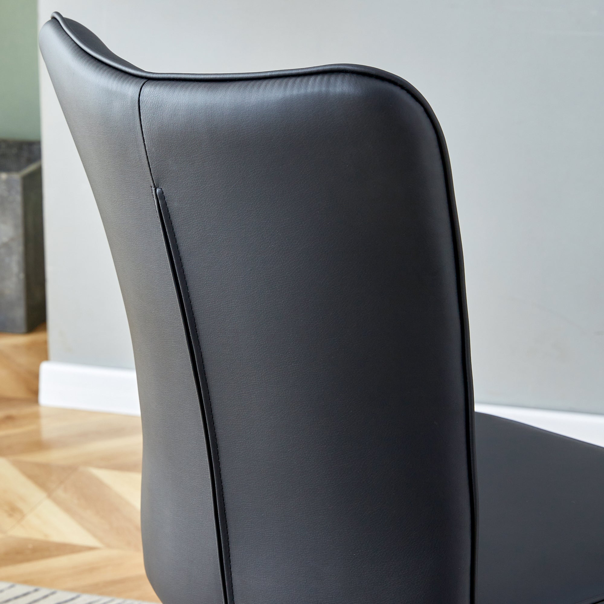 Modern Black PU Chair Set - Four Pieces, The backrest has a vertical