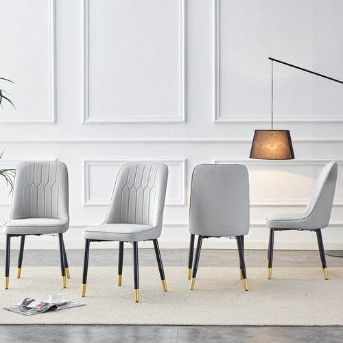 Modern dining chairs are equipped with light gray PU artificial