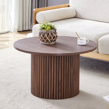 A modern circular coffee table with a diameter of 27.5 inches. MDF