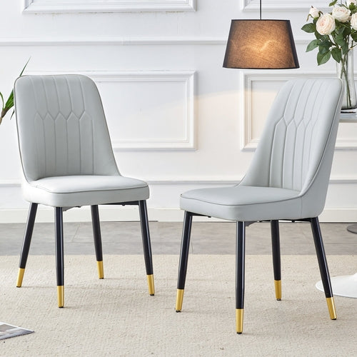 Light gray dining chairs and living room chairs. PU material and metal