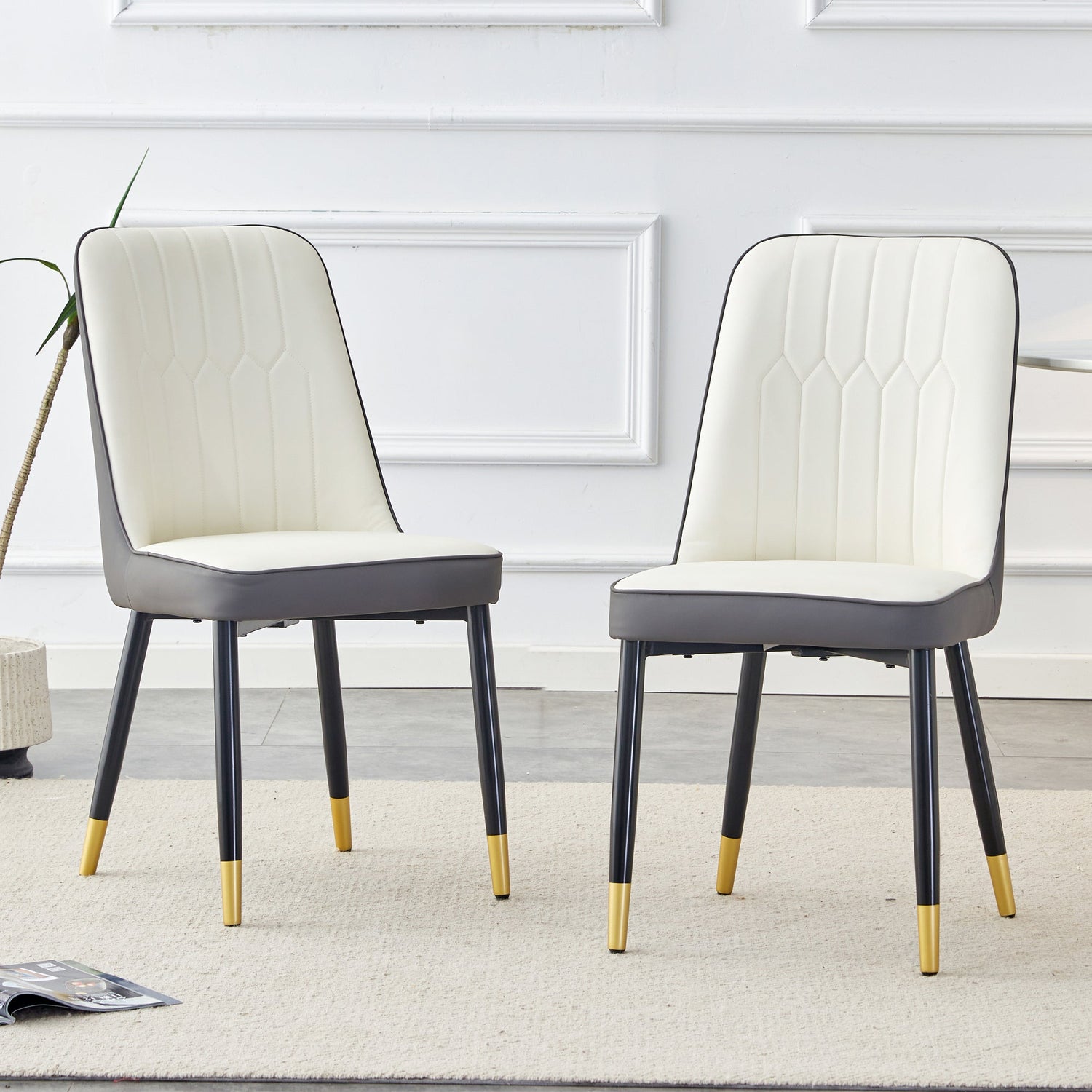 A modern dining chair with a white dark gray dual tone PU leather