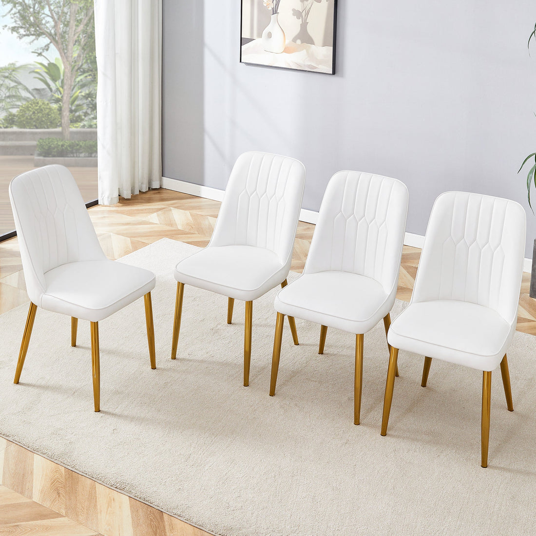 4 modern dining chairs, sleek PU leather backrest, and gold metal legs