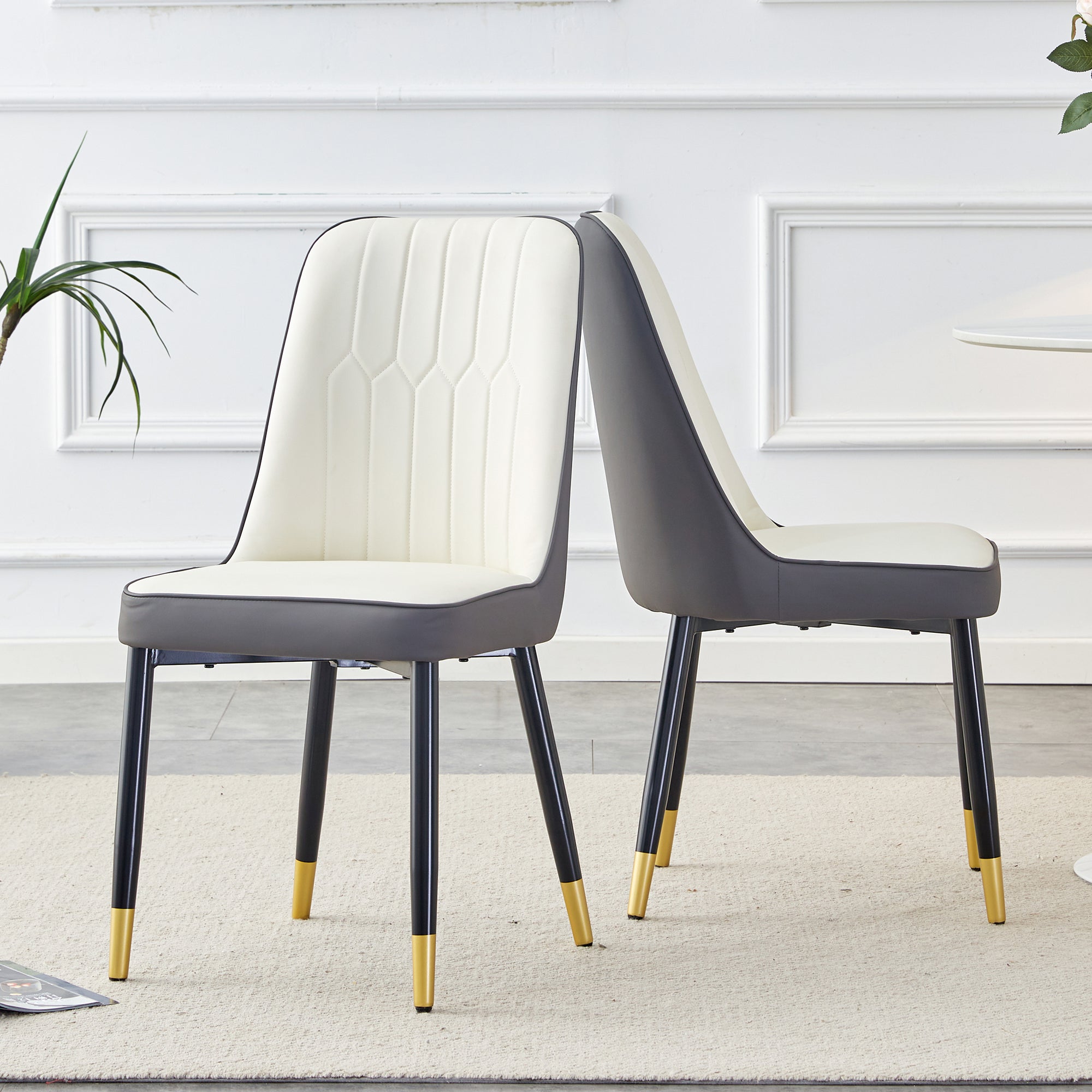 A modern dining chair with a white dark gray dual tone PU leather